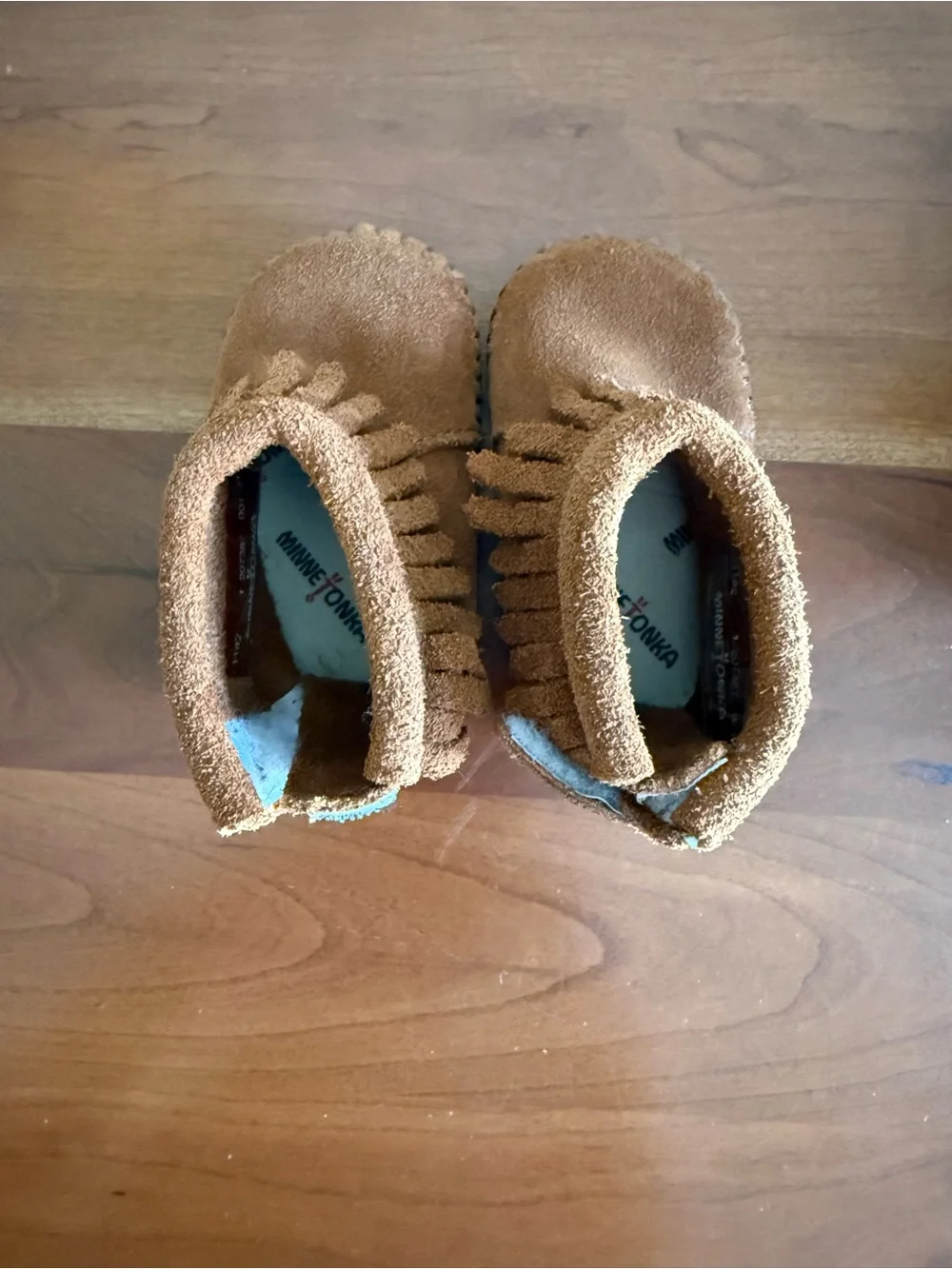 Minnetonka Kids Suede Fringe Moccasins in Brown